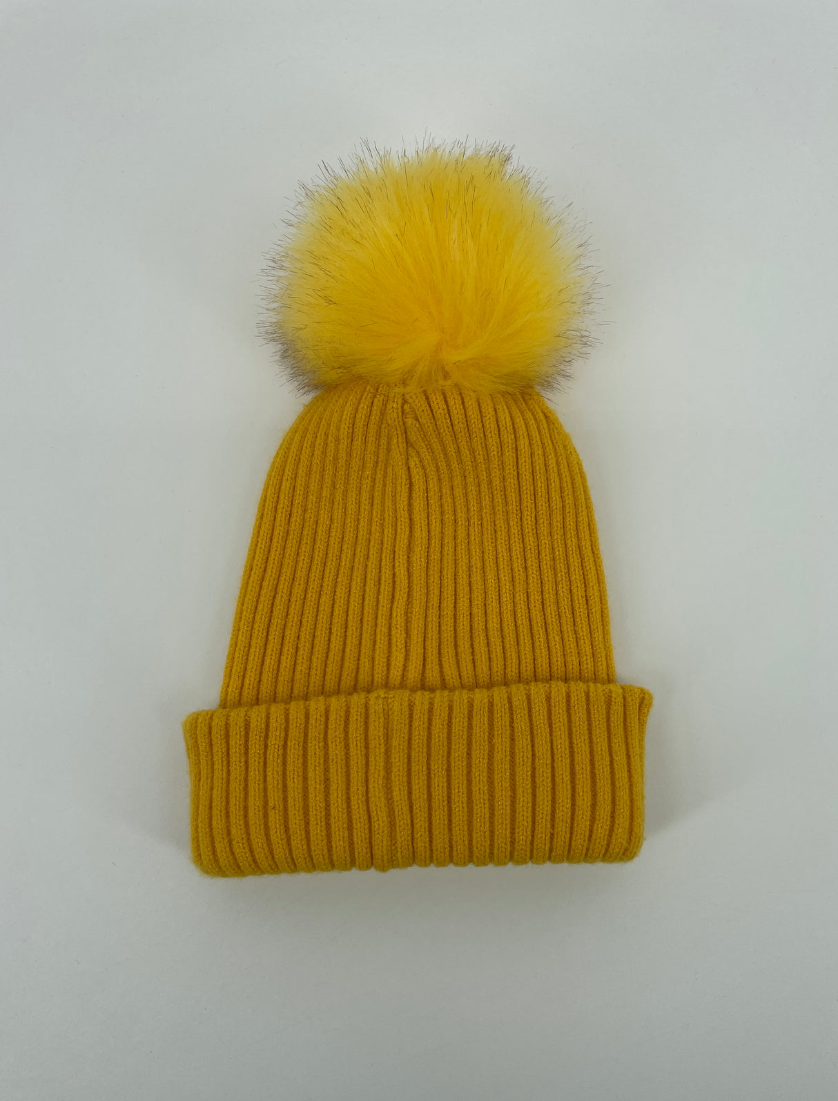 Muts Geel Pompon Maat 4 - 8 Jaar