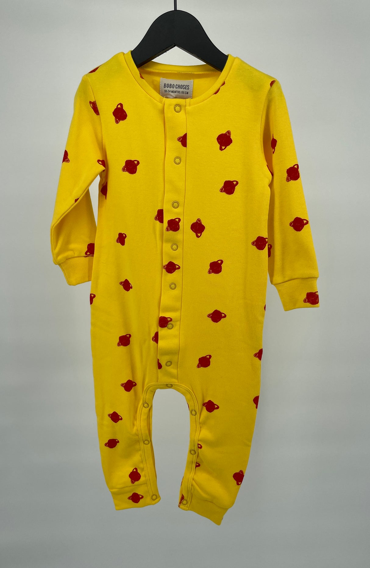 Jumpsuit Geel Rood Saturnus Maat 86 / 92