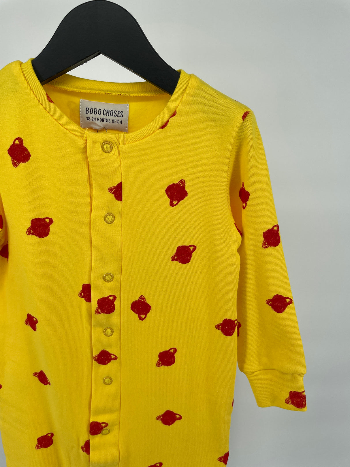 Jumpsuit Geel Rood Saturnus Maat 86 / 92