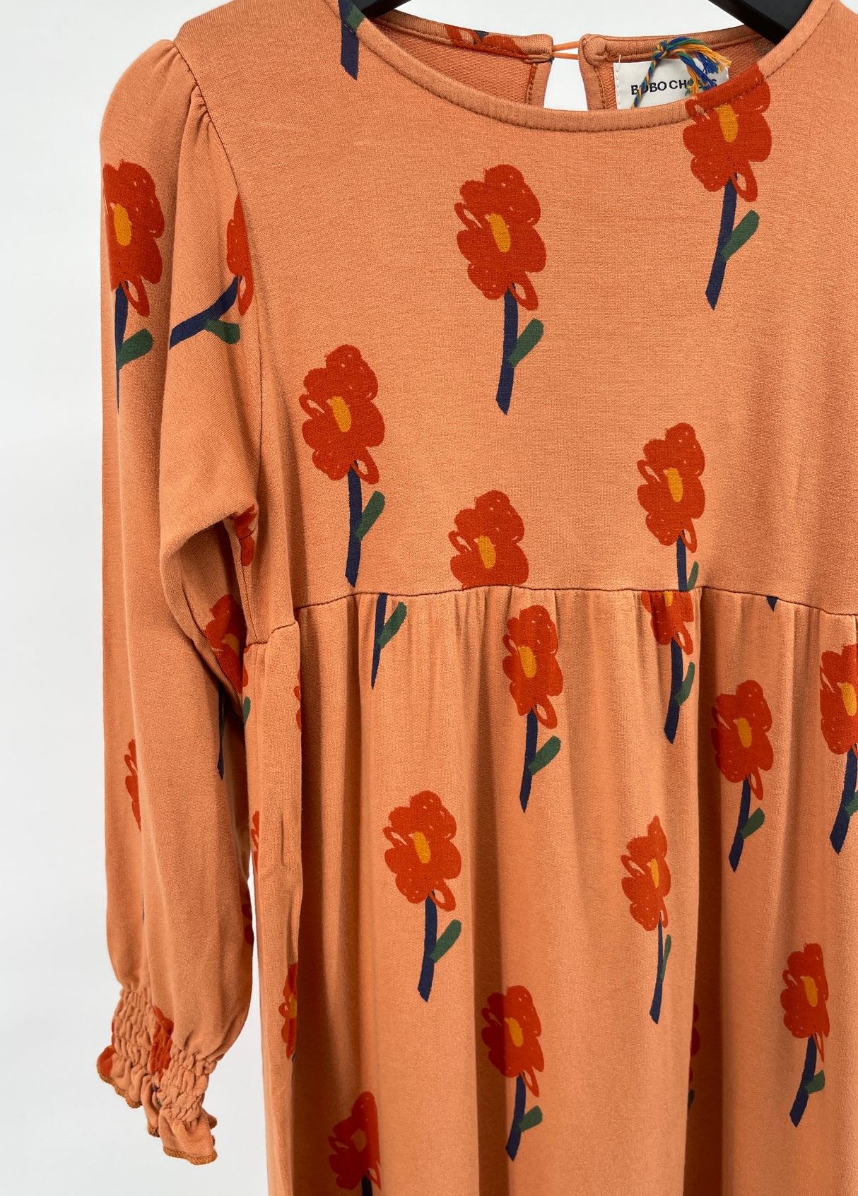 Jurk Lange Mouwen Oranje met Bloemetjes Print Maat 116 / 122