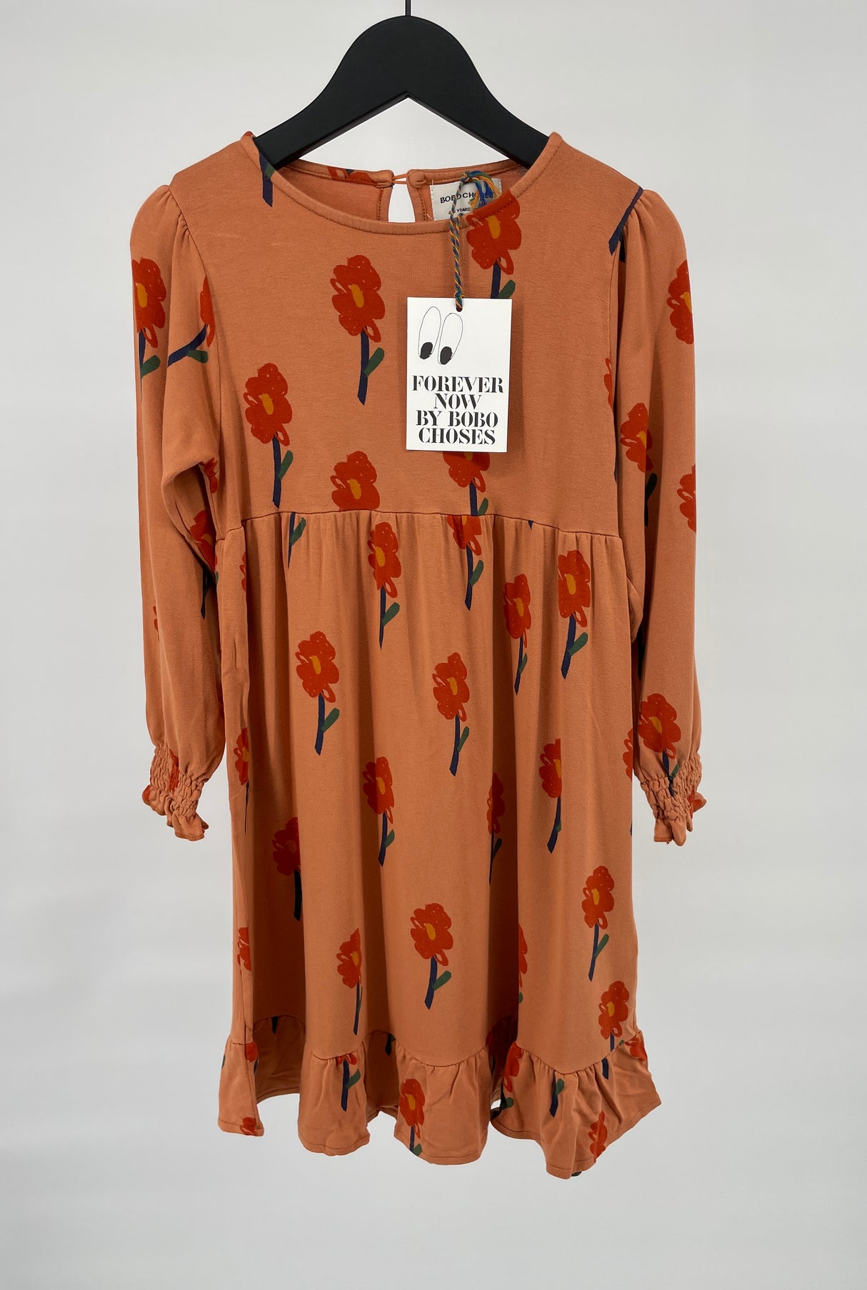 Jurk Lange Mouwen Oranje met Bloemetjes Print Maat 116 / 122