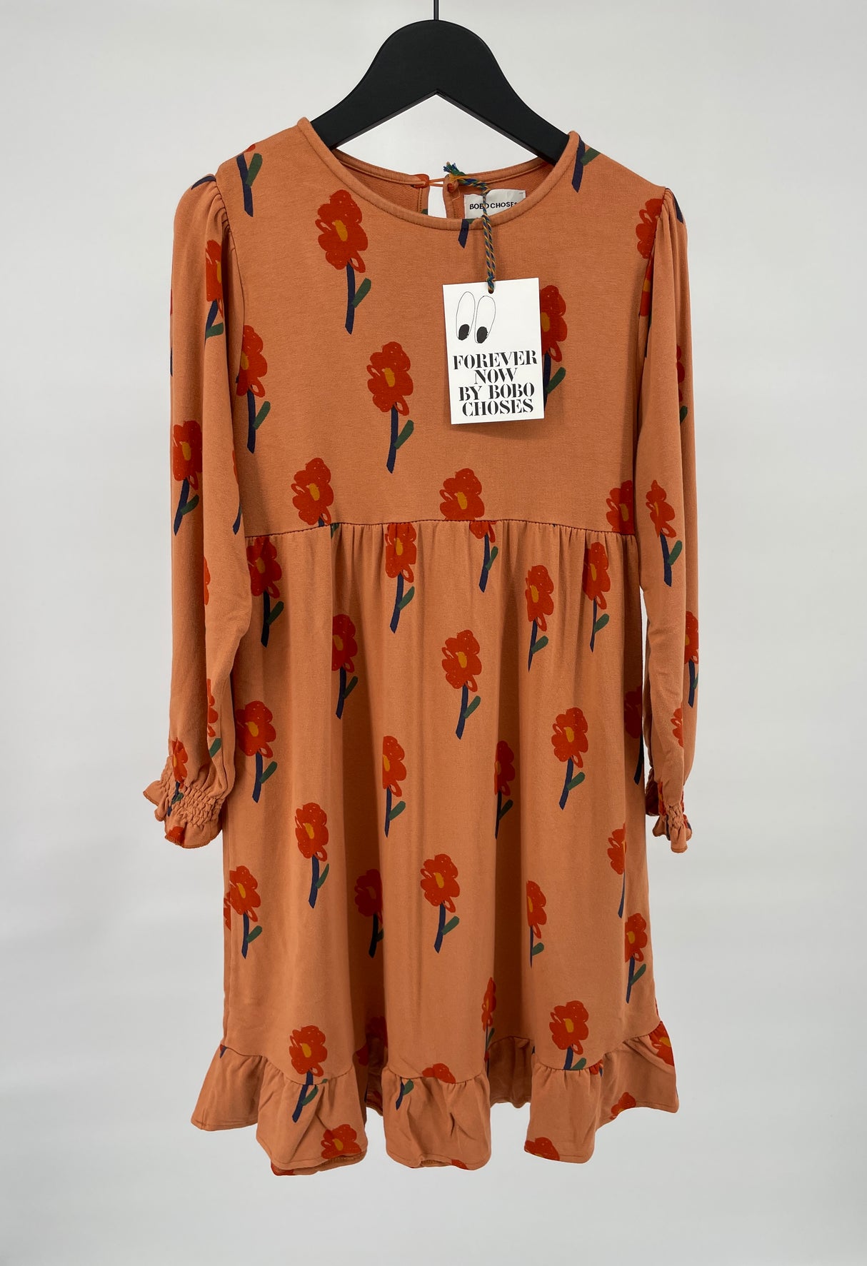 Jurk Lange Mouwen Oranje met Bloemetjes Print Maat 116 / 122