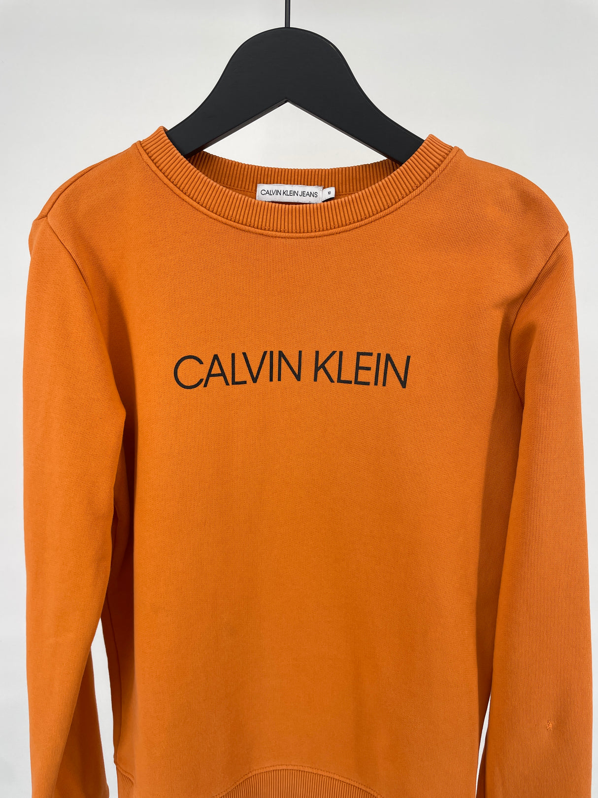 Trui Oranje met Logo Maat 140