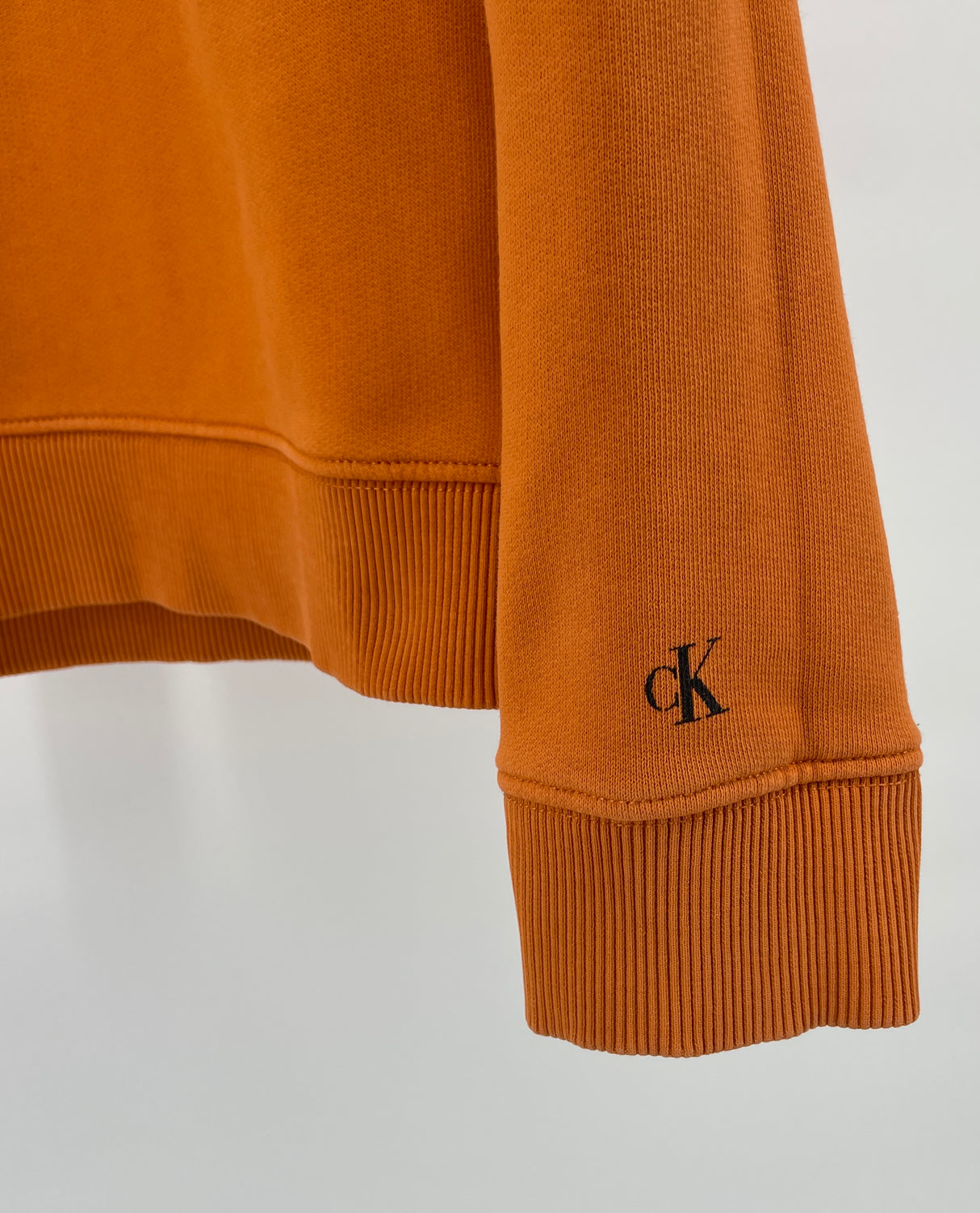 Trui Oranje met Logo Maat 140