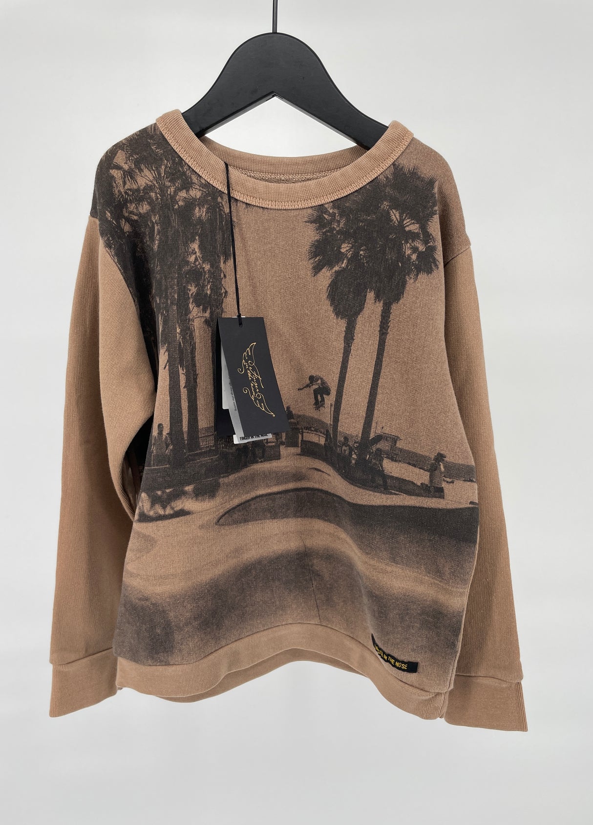 Trui Bruin met Skate Print Maat 110