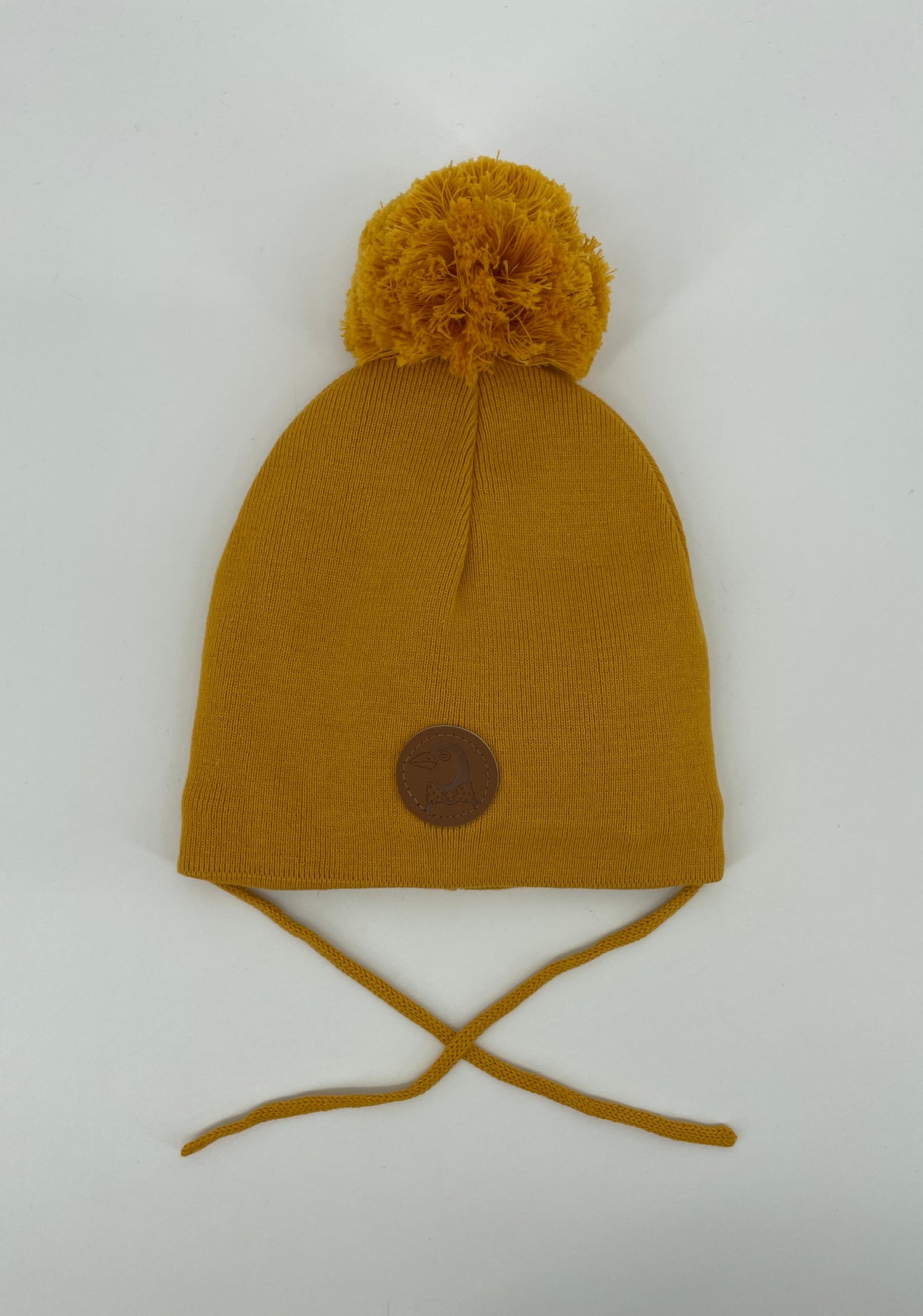 Muts Geel Pinguin Pompon Maat 9 Maanden – 3 Jaar