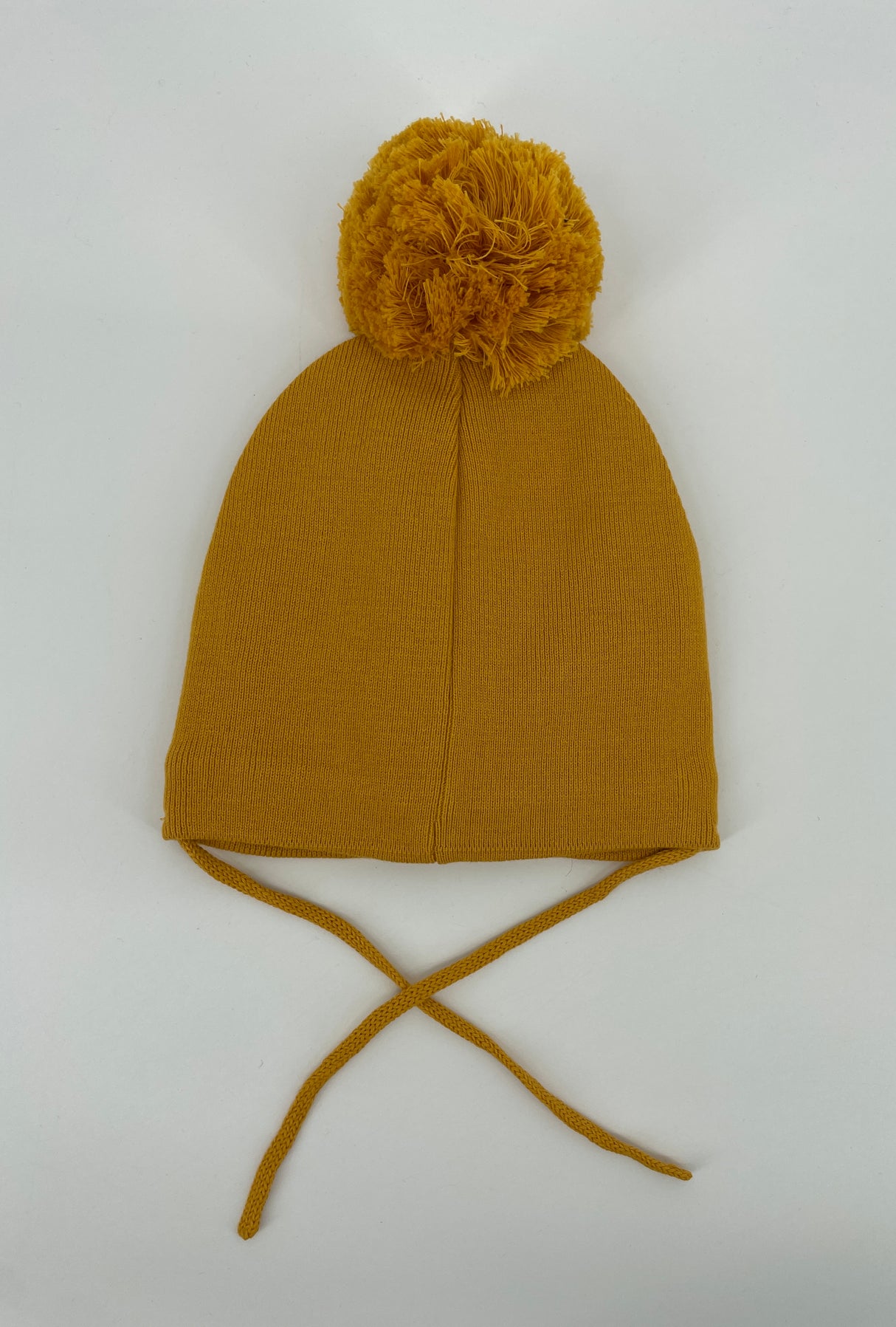 Muts Geel Pinguin Pompon Maat 9 Maanden – 3 Jaar