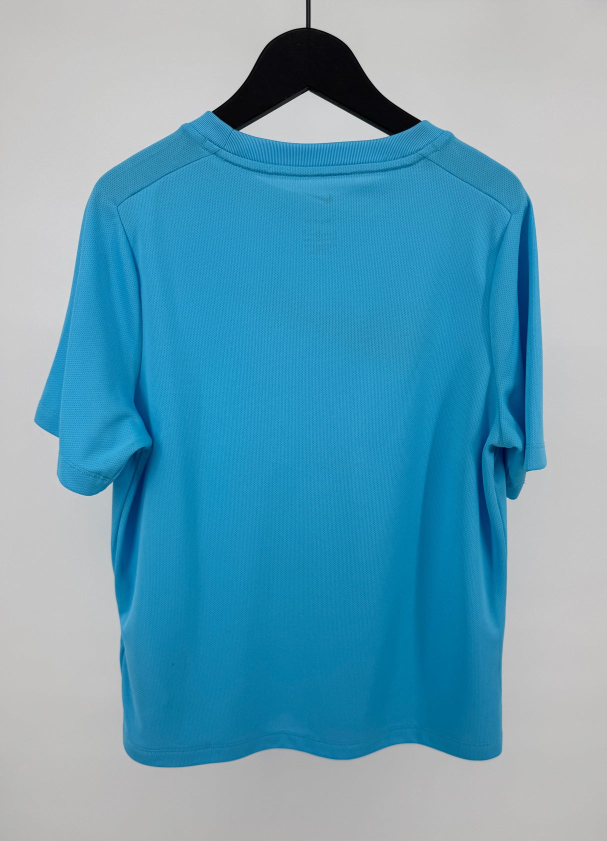 T-shirt Lichtblauw Witte Swoosh Maat 140 / 146