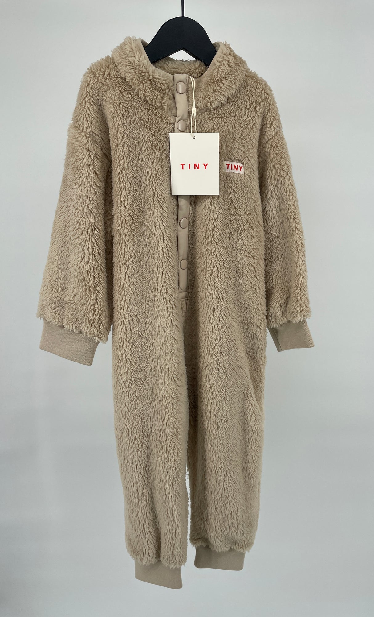 One Piece Beige Maat 104