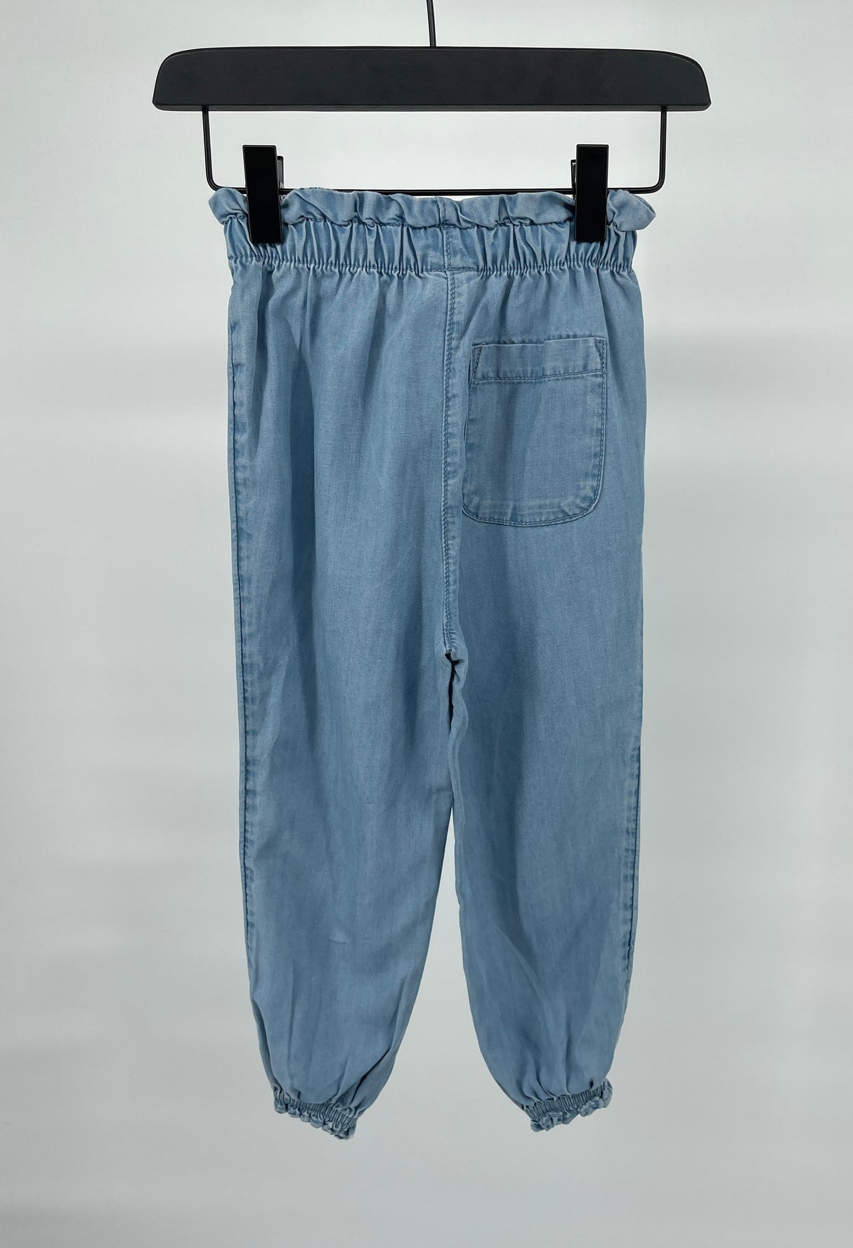 Set Lichtblauw Top Korte Mouw en Lange Broek Maat 104